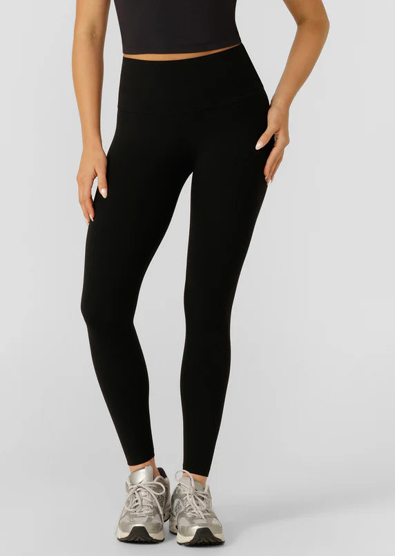 Model wearing black leggings