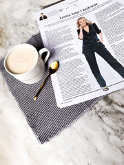 News article of Lorna Jane Clarkson, wearing a blue suit