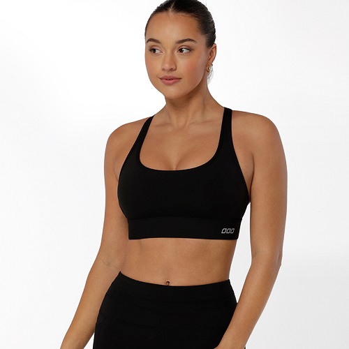 woman wearing ultra hold black maximum impact sports bra